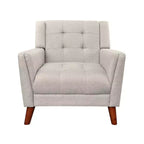 Fauteuil capitonné beige avec pieds en bois, une place